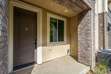 7366 Solstice Place Rancho Cucamonga, CA 91739 - Photo 2 of 32 a kitchen with granite countertop cabinets and stainless steel appliances