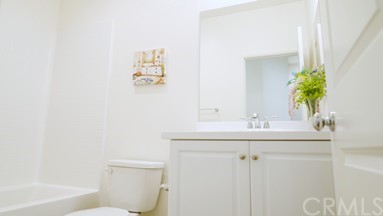7366 Solstice Place Rancho Cucamonga, CA 91739 - Photo 15 of 32 a bathroom with a sink a toilet and tub
