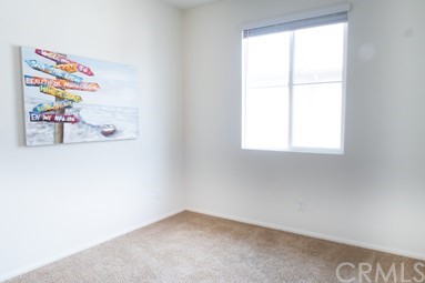 7366 Solstice Place Rancho Cucamonga, CA 91739 - Photo 17 of 32 an empty room with a window