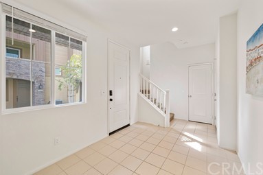 7366 Solstice Place Rancho Cucamonga, CA 91739 - Photo 3 of 32 a kitchen with stainless steel appliances granite countertop a sink and a stove