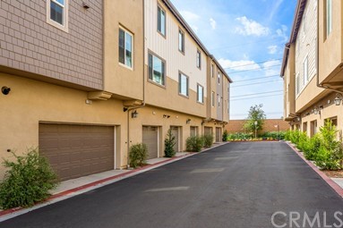 7366 Solstice Place Rancho Cucamonga, CA 91739 - Photo 21 of 32 a view of a building with a street