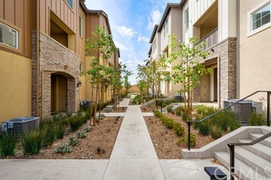 7366 Solstice Place Rancho Cucamonga, CA 91739 - Photo 27 of 32 a view of path along with potted plants
