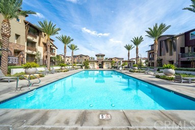 7366 Solstice Place Rancho Cucamonga, CA 91739 - Photo 32 of 32 a swimming pool with outdoor seating and yard
