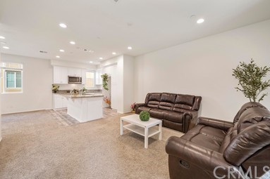 7366 Solstice Place Rancho Cucamonga, CA 91739 - Photo 8 of 32 an empty room with a window