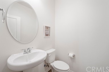 7366 Solstice Place Rancho Cucamonga, CA 91739 - Photo 9 of 32 a bathroom with a sink a toilet and tub