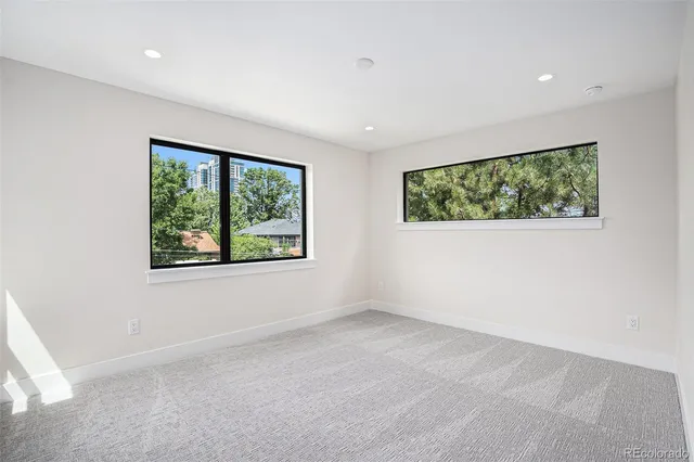 an empty room with windows