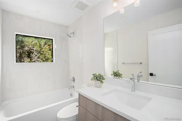 a bathroom with a sink and a bathtub