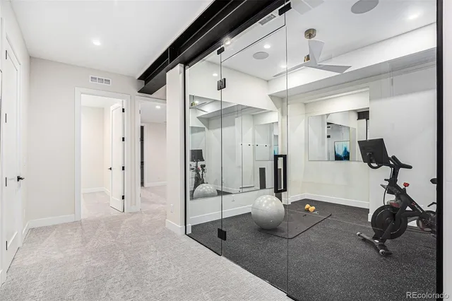 a bathroom with a sink a toilet a bathtub and shower