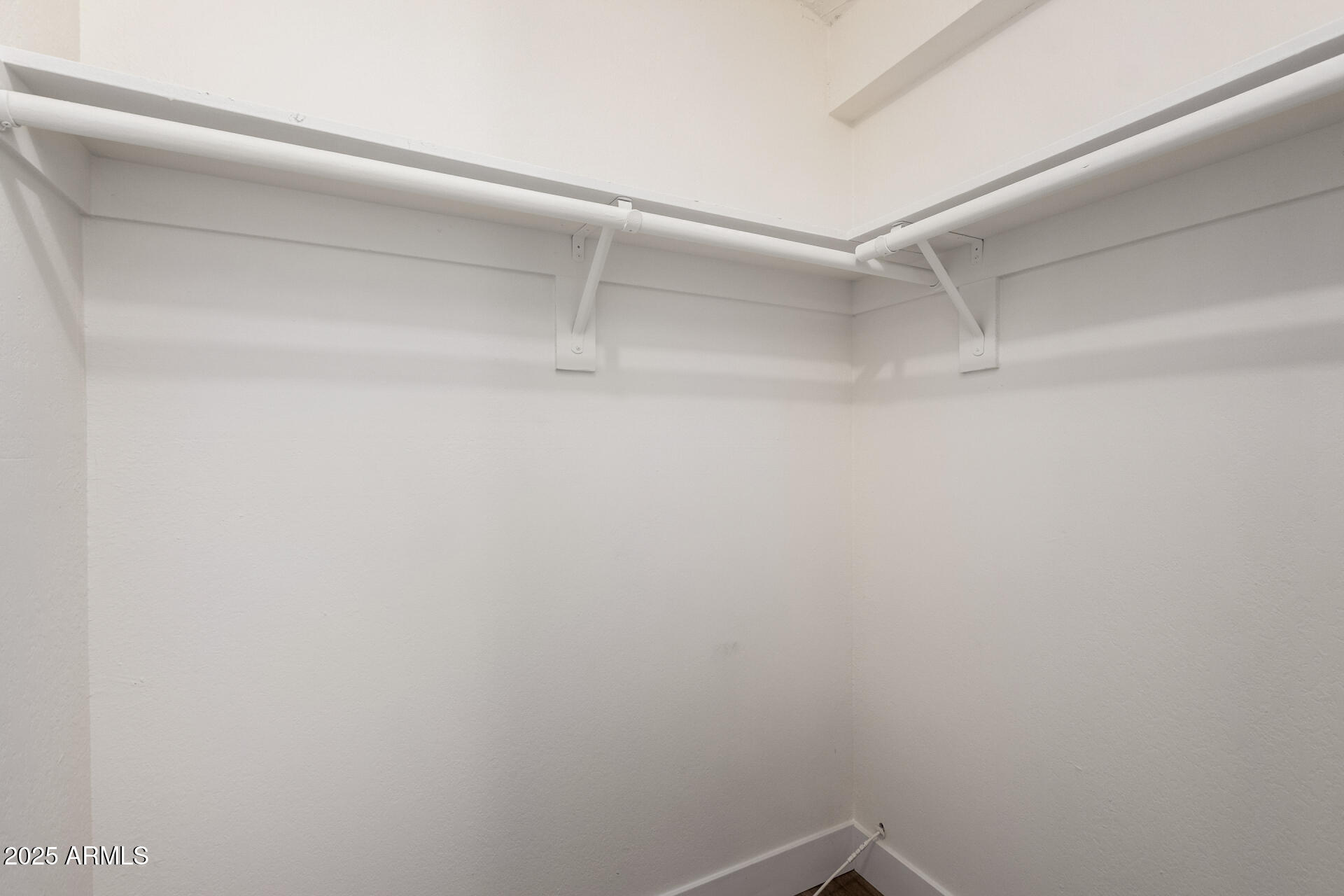 3825 East Camelback Road, Unit 234 Phoenix, AZ 85018 - Photo 18 of 42 Primary Walk-in Closet