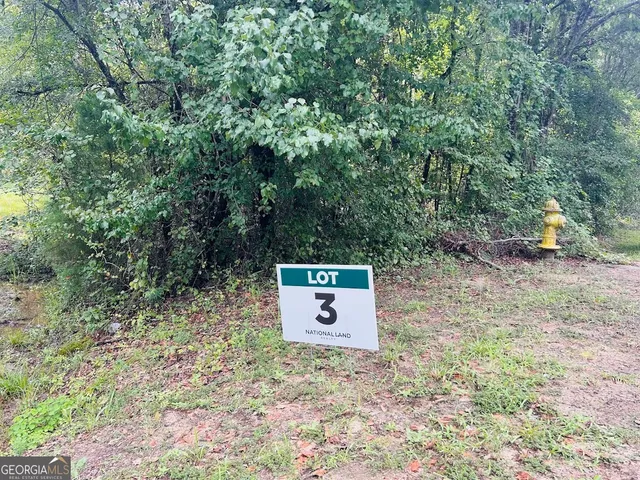 a view of a barn with a yard
