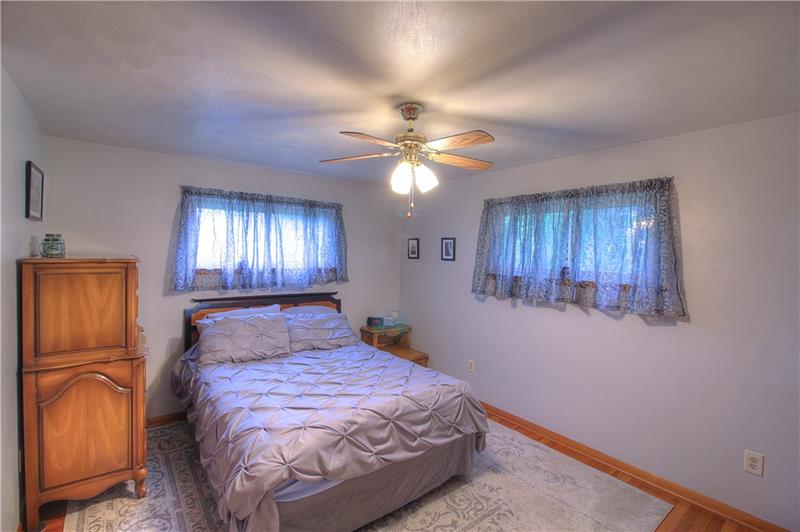 2014 Clayton Road Beaver Falls, PA 15010 - Photo 12 of 24 Master Bedroom boasts pristine walls, ceilings and gleaming hardwood floors. Bursts of sunshine through the privacy windows.