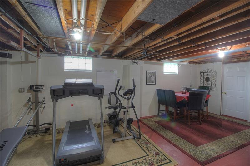 2014 Clayton Road Beaver Falls, PA 15010 - Photo 22 of 24 The lower level has so much space and so many uses....Possibilities are endless. Set up your exercise equipment. Or a 2nd dining/game area. An office. A bedroom. Adding a bathroom would be easy.