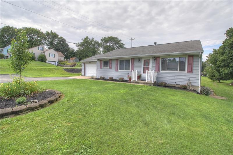 2014 Clayton Road Beaver Falls, PA 15010 - Photo 23 of 24 The front yard offers great frontage, pretty landscaping and ample parking with a back-up pad. Low/no maintenance vinyl siding and rails.