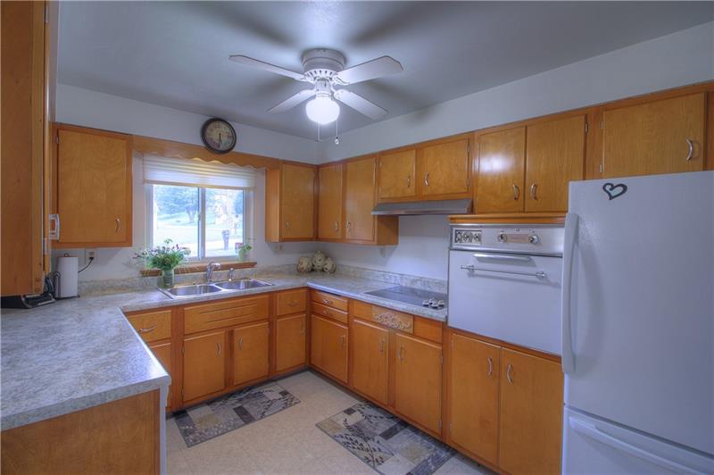 2014 Clayton Road Beaver Falls, PA 15010 - Photo 9 of 24 The kitchen sparkles! The U-Shaped design affords abundant counterspace and cabinetry to store your favorite tools and create your best culinary delights!
