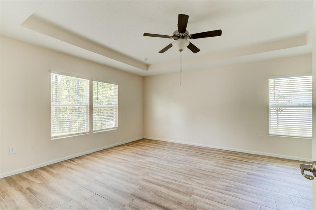 9 Ace Court Bunnell, FL 32110 - Photo 12 of 51 a view of a big room with wooden floor and a window