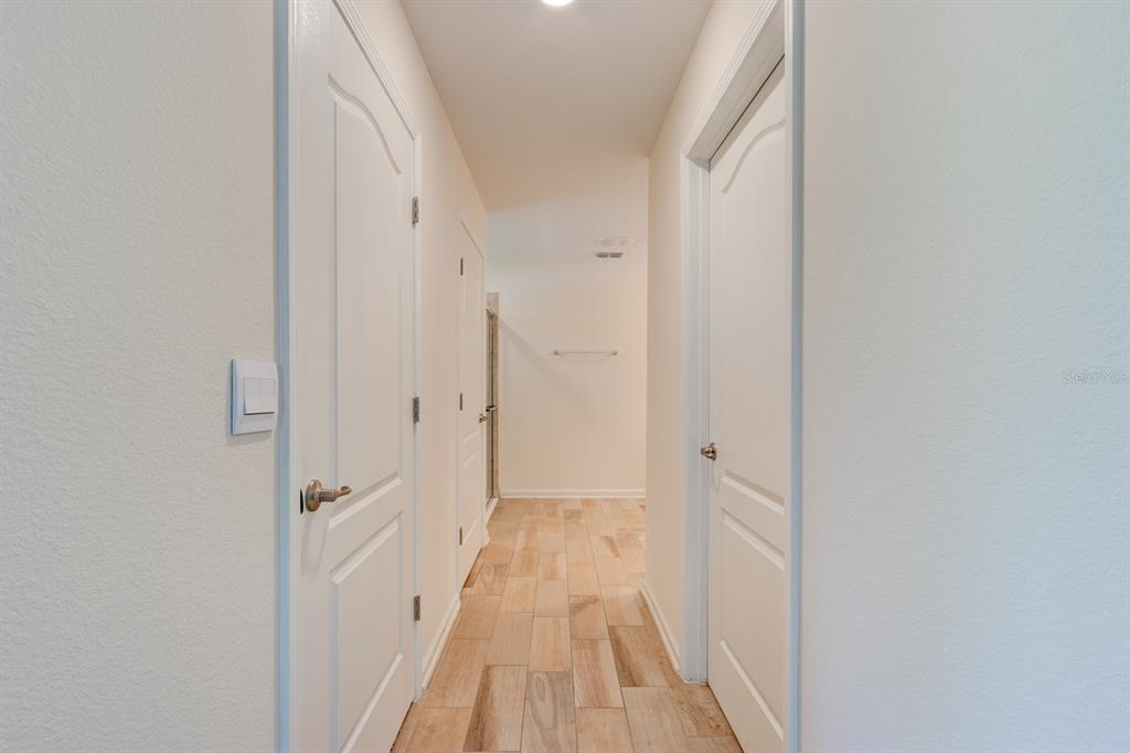 9 Ace Court Bunnell, FL 32110 - Photo 15 of 51 a view of a bathroom from the hallway