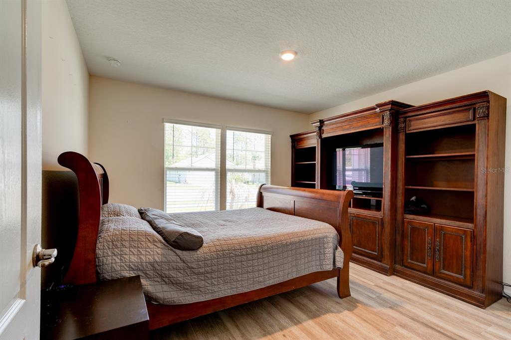 9 Ace Court Bunnell, FL 32110 - Photo 22 of 51 a bedroom with a bed and a large window