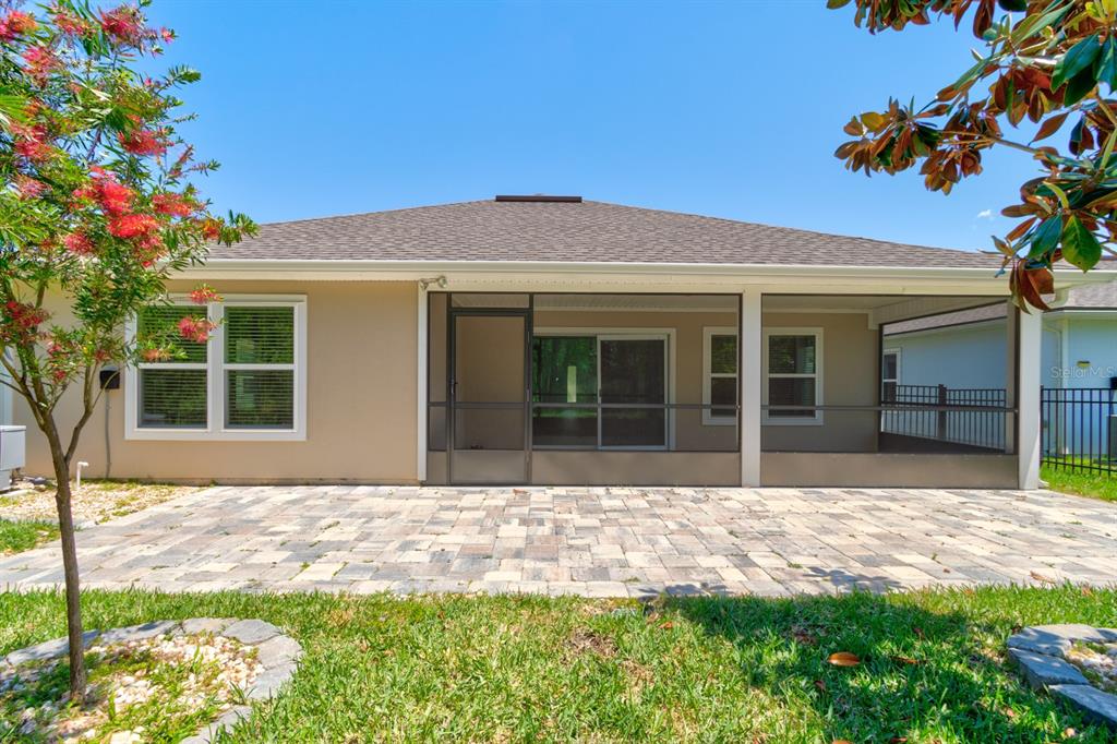 9 Ace Court Bunnell, FL 32110 - Photo 28 of 51 a front view of a house with a yard and garage
