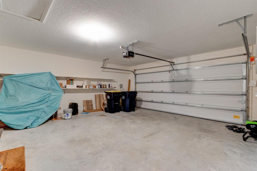 9 Ace Court Bunnell, FL 32110 - Photo 32 of 51 a view of a room with furniture and a ceiling fan