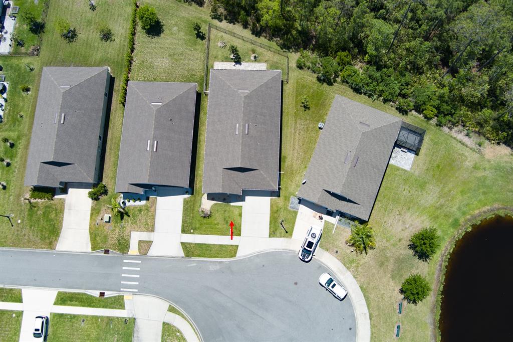 9 Ace Court Bunnell, FL 32110 - Photo 35 of 51 an aerial view of a house with a garden and a yard
