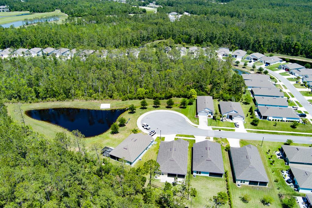 9 Ace Court Bunnell, FL 32110 - Photo 37 of 51 an aerial view of a house with yard swimming pool and outdoor seating
