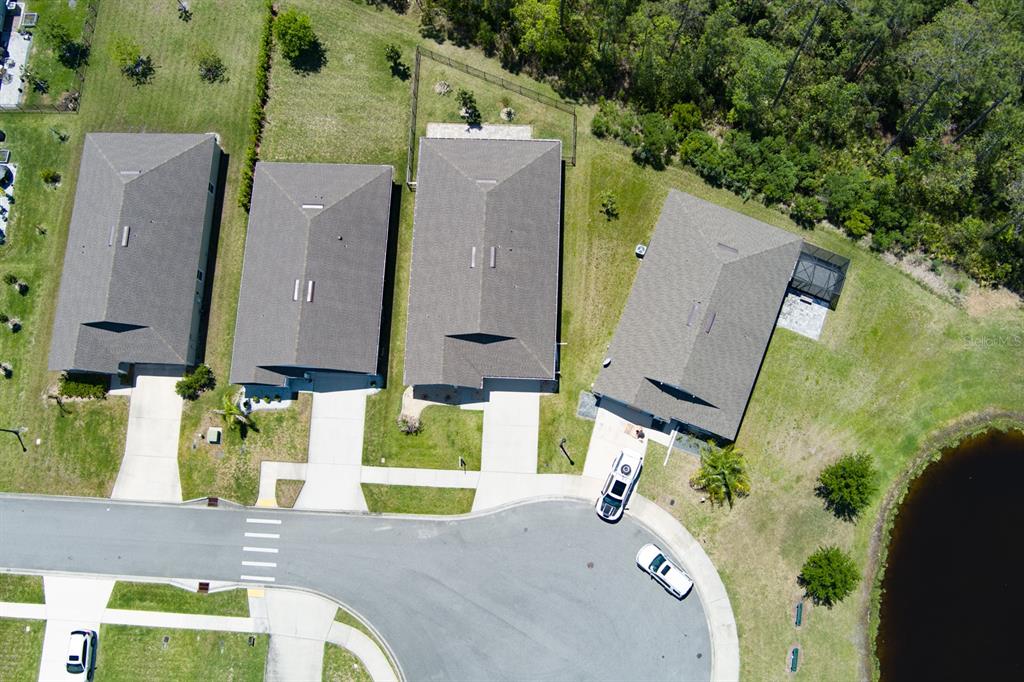 9 Ace Court Bunnell, FL 32110 - Photo 39 of 51 an aerial view of a house with a garden and a yard
