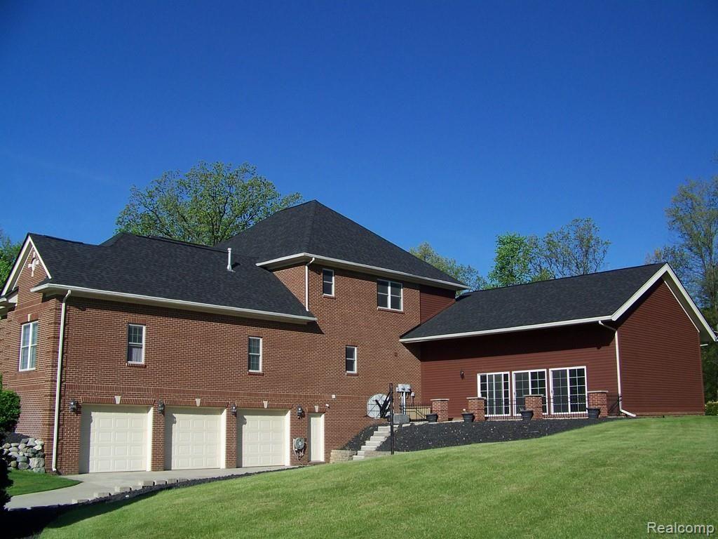 9247 Crockett Farm Road South Lyon, MI 48178 - Photo 47 of 50 47 side.jpg