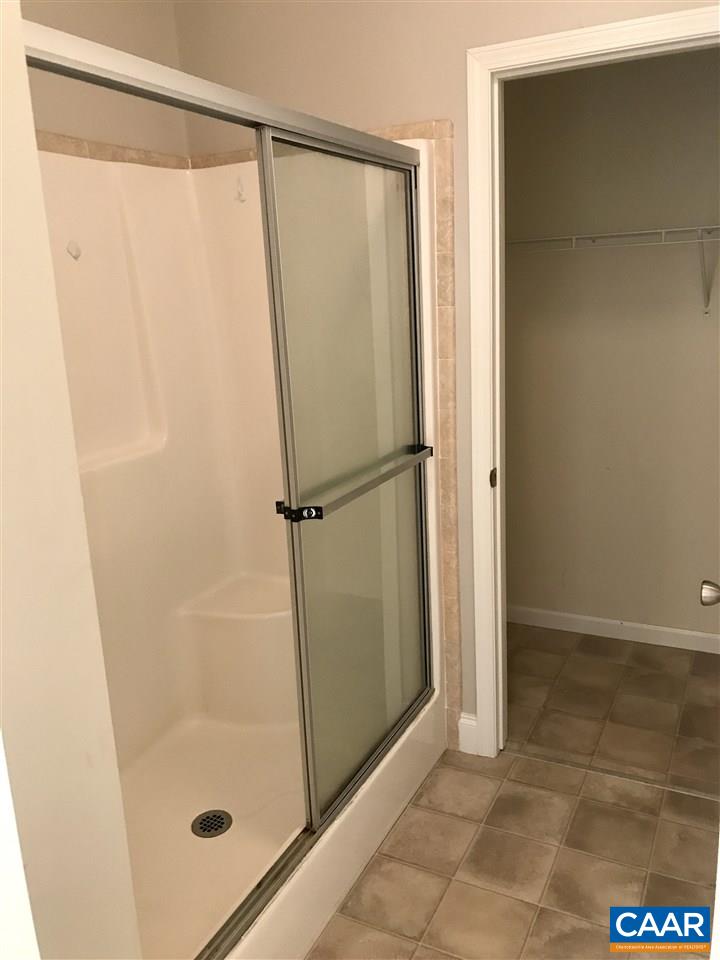 294 Chopping Road Mineral, VA 23117 - Photo 11 of 32 a bathroom with a glass shower door