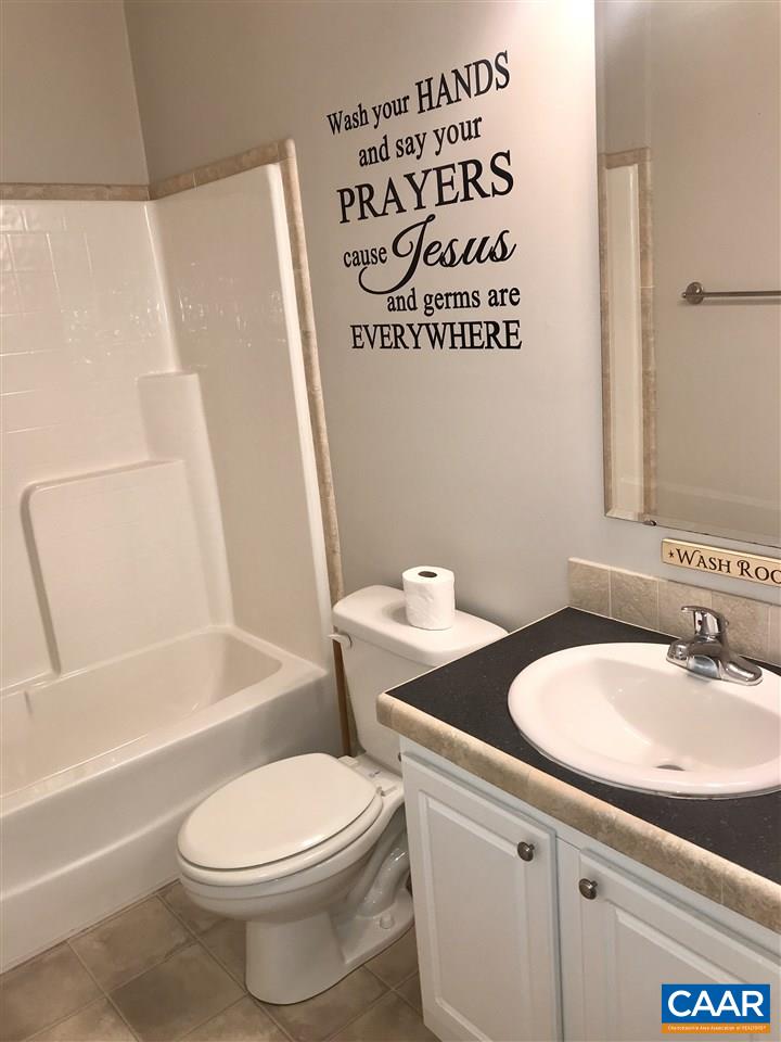 294 Chopping Road Mineral, VA 23117 - Photo 16 of 32 a white toilet sitting next to a bath tub