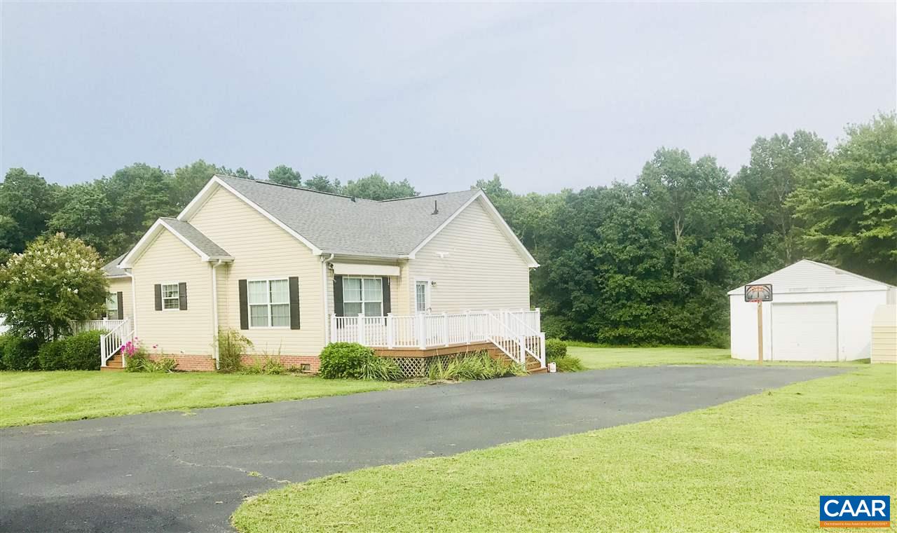 294 Chopping Road Mineral, VA 23117 - Photo 31 of 32 a front view of a house with a yard and garage