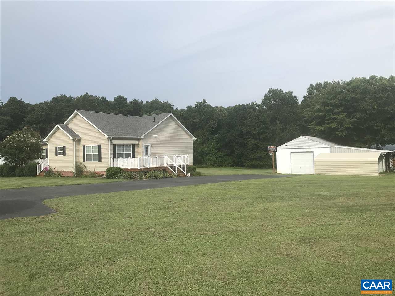 294 Chopping Road Mineral, VA 23117 - Photo 32 of 32 a front view of a house with a yard and garage