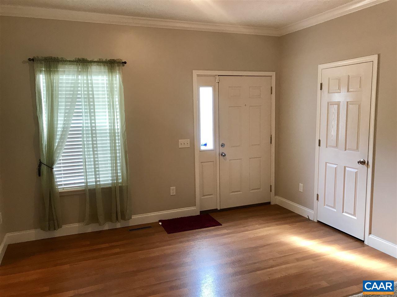 294 Chopping Road Mineral, VA 23117 - Photo 7 of 32 an empty room with wooden floor and windows