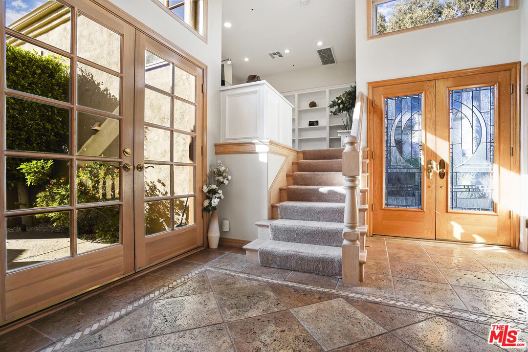 19 Ranchero Road Bell Canyon, CA 91307 - Photo 16 of 42 a view of entryway and hall with wooden floor