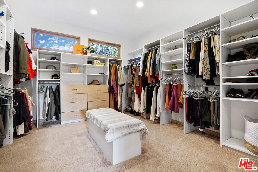 19 Ranchero Road Bell Canyon, CA 91307 - Photo 26 of 42 a view of walk in closet with clothes