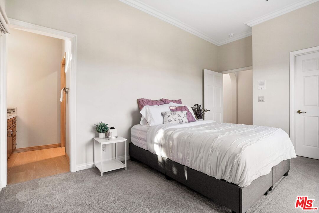 19 Ranchero Road Bell Canyon, CA 91307 - Photo 30 of 42 a bedroom with a bed and a table