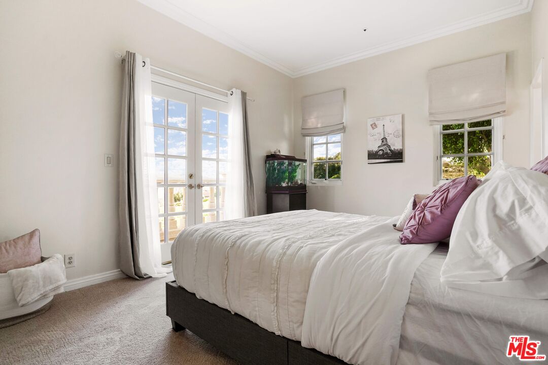 19 Ranchero Road Bell Canyon, CA 91307 - Photo 31 of 42 a bedroom with bed and window