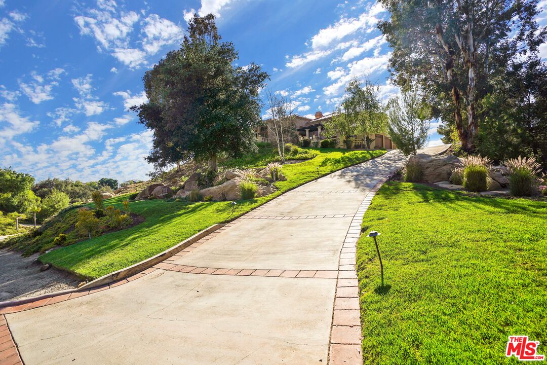 19 Ranchero Road Bell Canyon, CA 91307 - Photo 39 of 42 a view of swimming pool from a garden