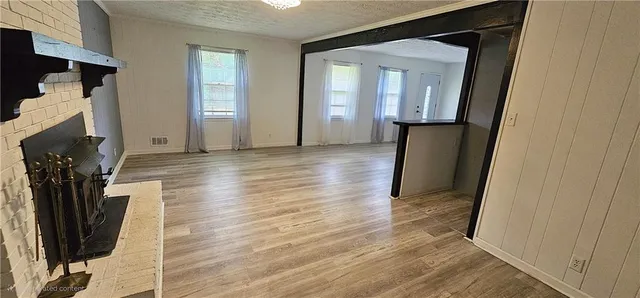 a view of a livingroom with a fireplace