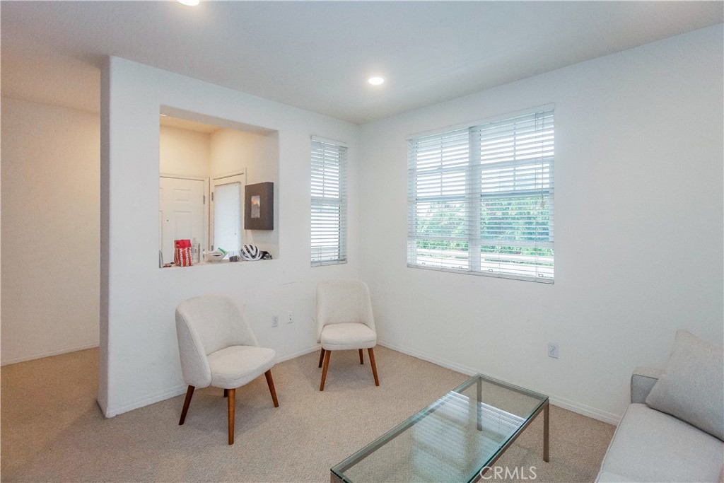 825 Francesca Drive, Unit 202 Walnut, CA 91789 - Photo 4 of 8 a living room with furniture and a window