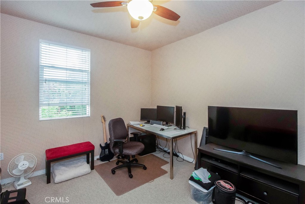 825 Francesca Drive, Unit 202 Walnut, CA 91789 - Photo 5 of 8 a livingroom with workspace and a window