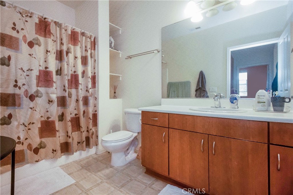 825 Francesca Drive, Unit 202 Walnut, CA 91789 - Photo 6 of 8 a bathroom with a sink toilet and shower