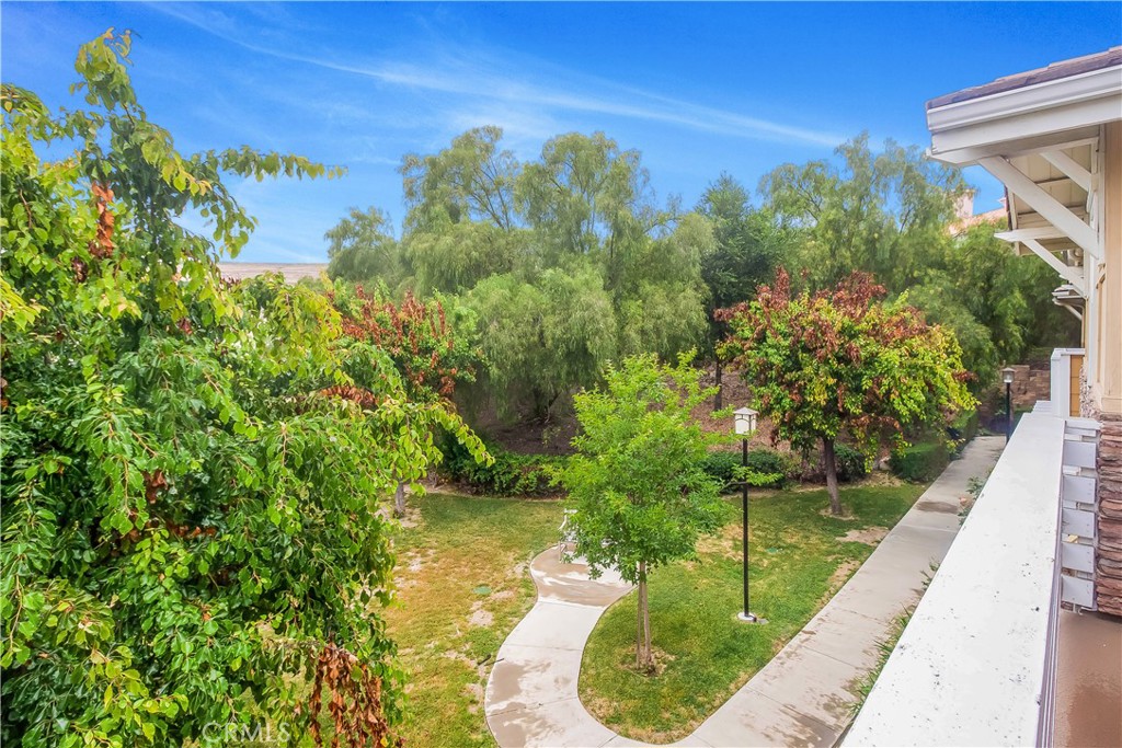 825 Francesca Drive, Unit 202 Walnut, CA 91789 - Photo 7 of 8 a view of a lake from a balcony