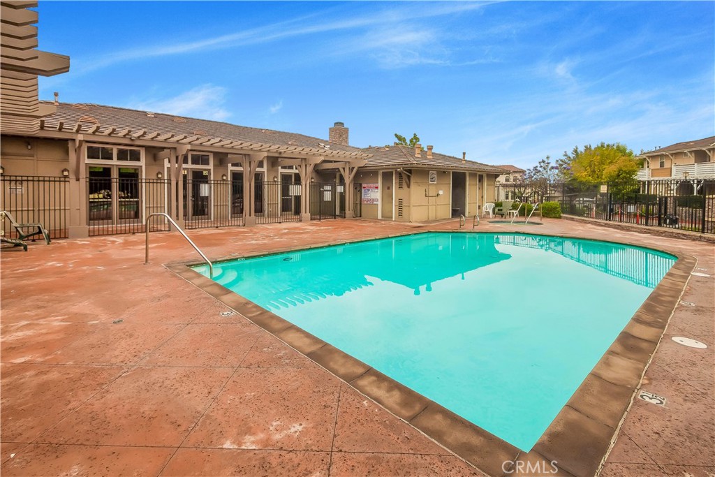 825 Francesca Drive, Unit 202 Walnut, CA 91789 - Photo 8 of 8 a front view of a house with swimming pool