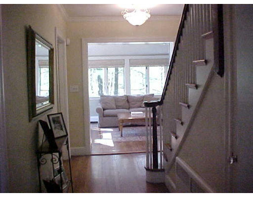 47 Palmer Road Newton, MA 02468 - Photo 4 of 8 a living room with furniture and a large window