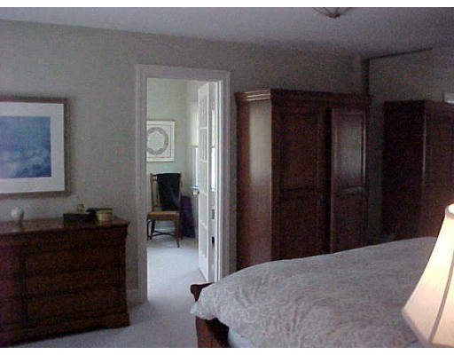 47 Palmer Road Newton, MA 02468 - Photo 6 of 8 a bedroom with a bed and a dresser