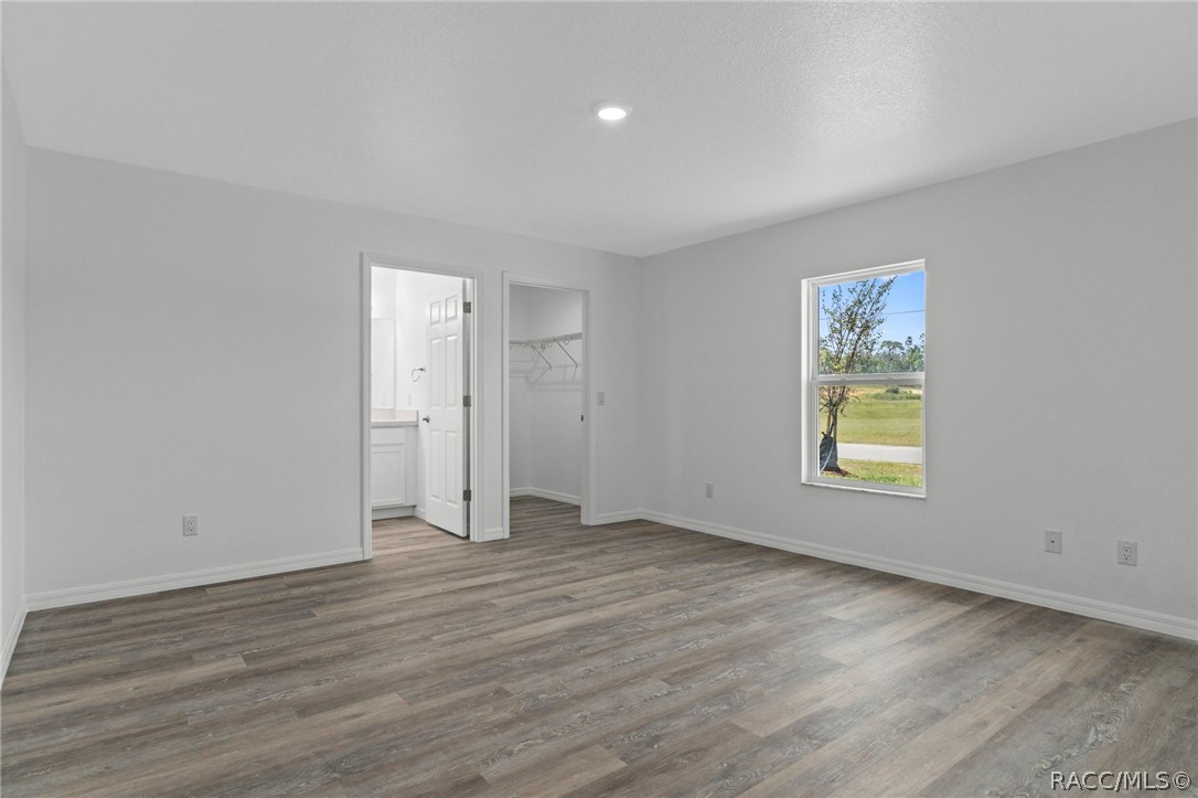 2159 West Nicholas Shane Drive Dunnellon, FL 34434 - Photo 17 of 38 Master Bedroom, Master Bath, Walk-in Closet