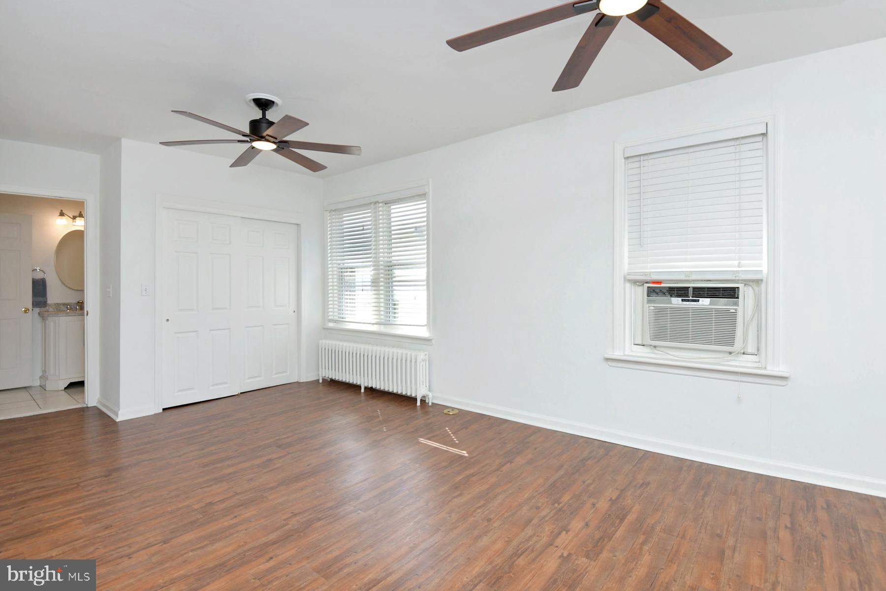 1740 Prospect Street Ewing, NJ 08638 - Photo 12 of 26 a view of empty room with wooden floor and fan