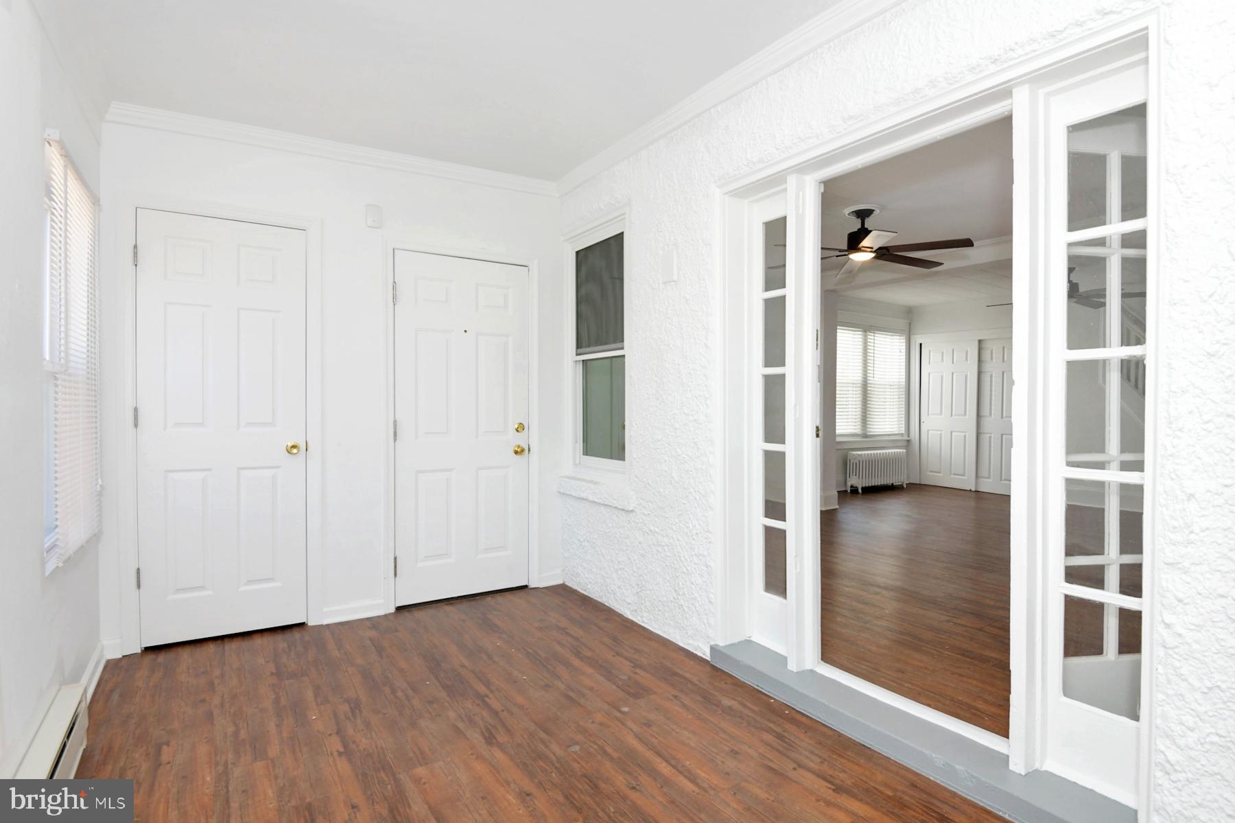 1740 Prospect Street Ewing, NJ 08638 - Photo 16 of 26 wooden floor in a hall with an entryway