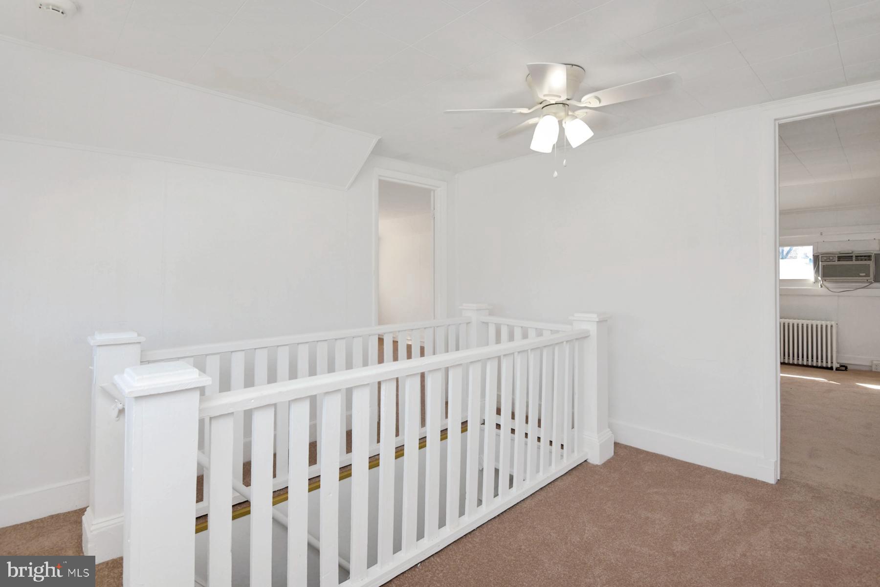1740 Prospect Street Ewing, NJ 08638 - Photo 20 of 26 a view of staircase with white walls and fan