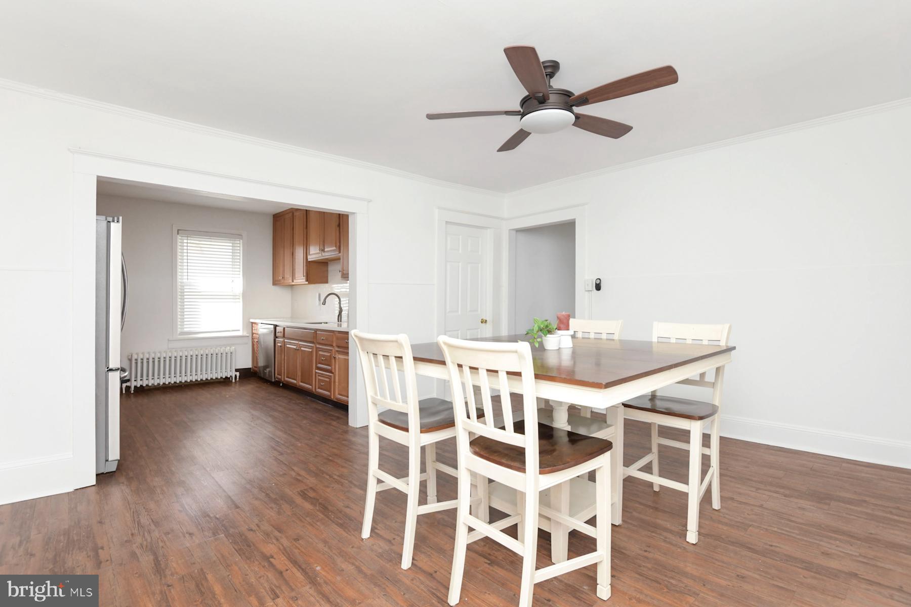1740 Prospect Street Ewing, NJ 08638 - Photo 7 of 26 a view of a dining room with furniture and wooden floor
